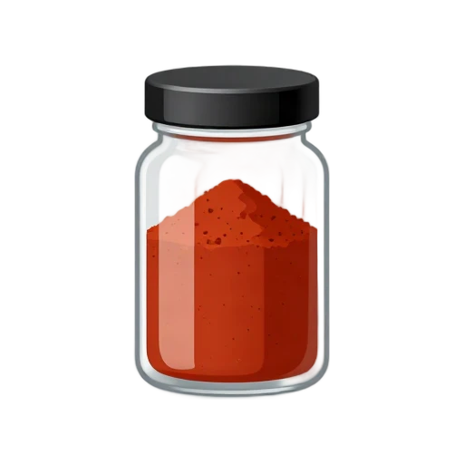 Glass spice jar full of bright red paprika with a black lid