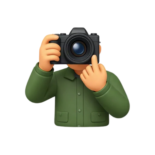 Photographer holding a camera to one eye