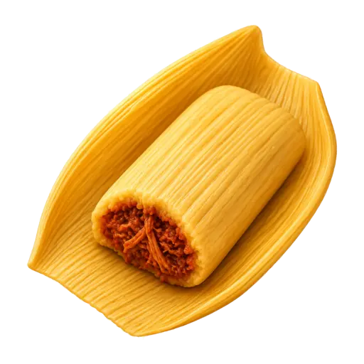 Pork tamale resting in a broad opened corn husk